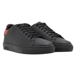 Sneakers<Moschino e lædersneakers med rød kontrastindsats Sort